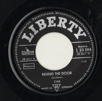 Cher : Behind The Door / Magic In The Air (I Feel Something In The Air) (7", Single)