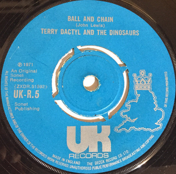 Terry Dactyl And The Dinosaurs : Sea Side Shuffle / Ball And Chain (7", Single, Pus)