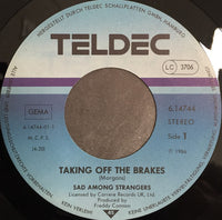 Sad Among Strangers : Taking Off The Brakes (7", Single)