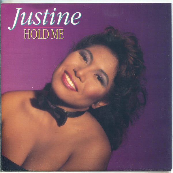 Justine Pelmelay : Hold Me (7", Single)